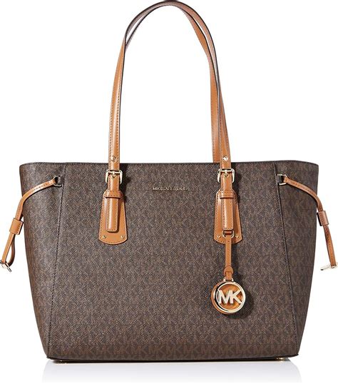 michael kors handbags new arrivals|michael kors bag original price.